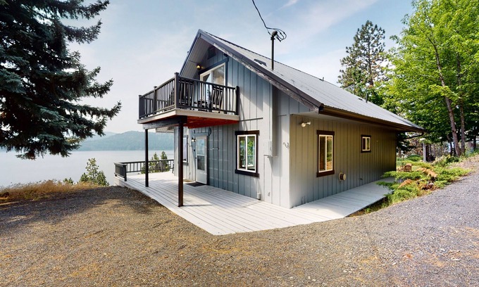 Harrison Casa | Amazing lake-view cabin with balcony, firepit, grill, wood stove, & W/D