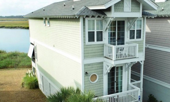 Bonito Boathouses Casa | Amazing marsh water views, golf cart included