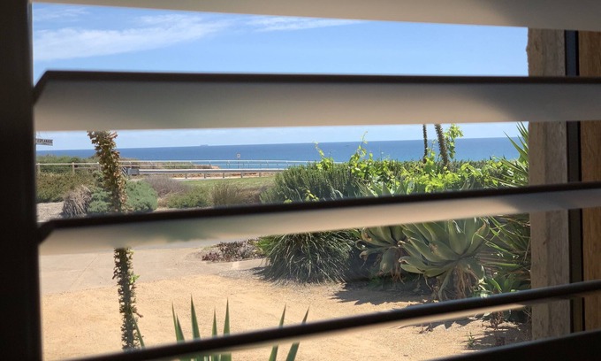 Port Noarlunga South Cama Y Desayuno | Impresionante apartamento frente al mar - Puestas de sol, desayuno, vista al agua