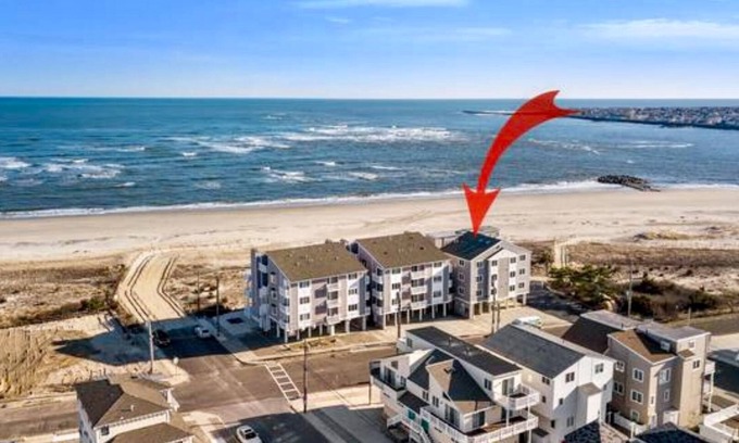 Townsend's Inlet Condominio | Increíble frente al mar de dos niveles Condo