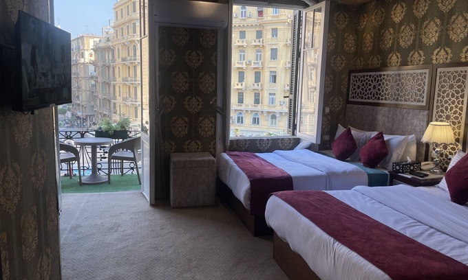 As-Sajil Hotel | HABITACIÓN TRIPLE PRIVADA. VISTA A LA CIUDAD