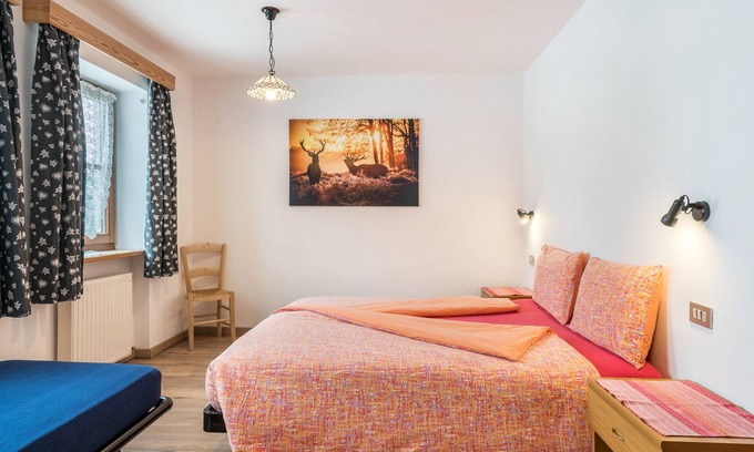 Livinallongo del Col di Lana Apartamento | Apartamento 'Agriturismo El Cirum Boe' con vistas a la montaña, jardín privado y Wi-Fi