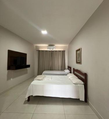 Patos de Minas Apartamento | Apartamento 102 - Suíte com ar condicionado