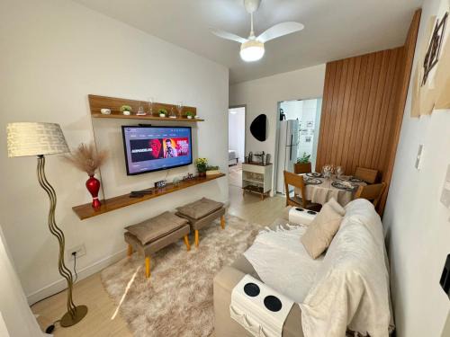 Guilhermina Apartamento | Apartamento 90m da praia, com estacionamento no local, wifi grátis, próximo ao shopping e centro da cidade