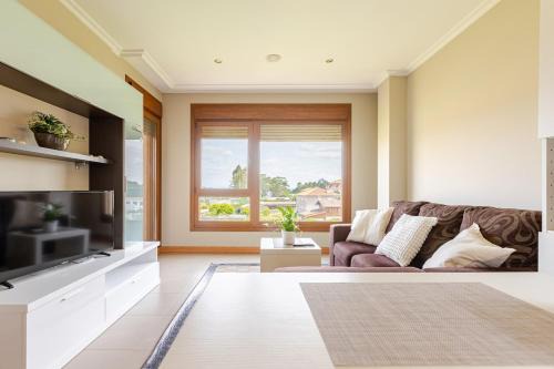 Sanxenxo Apartamento | Apartamento acogedor en la playa de La Lanzada