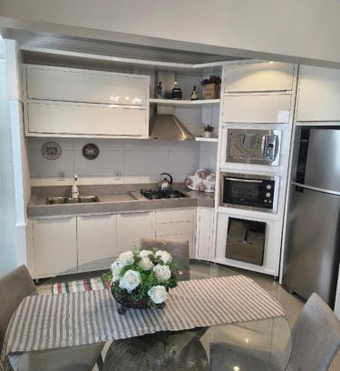 Piratuba Apartamento | Apartamento aconchegante com ar, secadora e adega