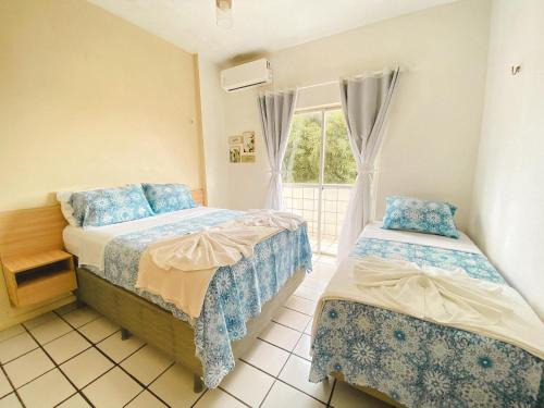 Sao Luis Apartamento | Apartamento amplo perto da Praia da Litorânea - Carmona Temporadas