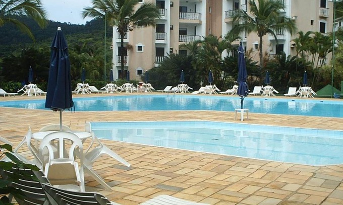 Toninhas Apartamento | Apartamento Condomínio Wembley Tênis - Toninhas - Ubatuba - SP
