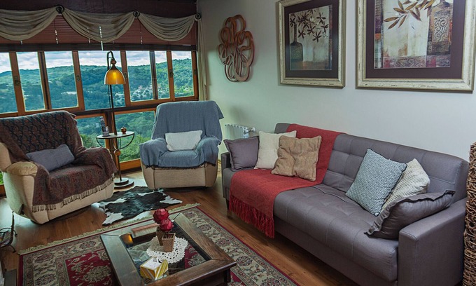Bavaria Apartamento | Apartamento duplex com lareira e WiFi - Gramado/RS