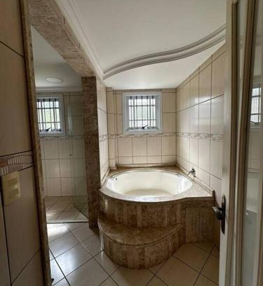 Borgo Casa | apartamento em bairro nobre suíte com ar condicionado e banheira com hidromassagem