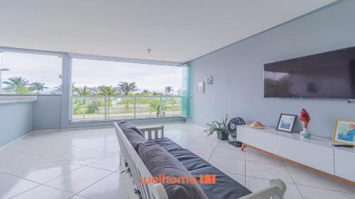 Morada da Praia Apartamento | Apartamento em Bertioga com vista para o mar