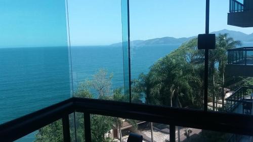 Mangaratiba Apartamento | Apartamento no Porto Real Resort com vista para o mar