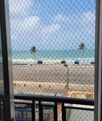 Mongagua Apartamento | Apartamento pé na areia de frente para o mar