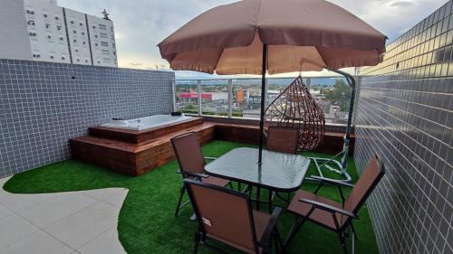 Capao da Canoa Apartamento | Apartamento Sofisticado Ed Del Paine terraço com hidro
