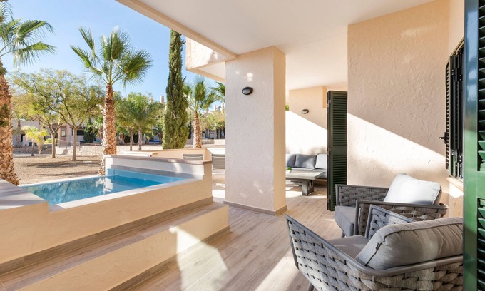 Fuente Álamo de Murcia Apartamento | Apartamento 'El Oasis Monaco 3 Bajo A' con piscina compartida, Wi-Fi y aire acondicionado.