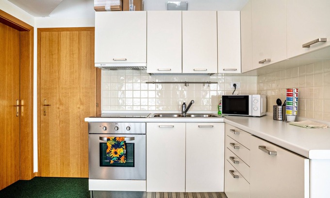 Marilleva Apartamento | Apartment 'Al Centro Delle Dolomiti' with Mountain View, Shared Terrace and Wi-Fi