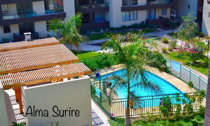 Arica Apartamento | Apartamento Alma Surire vista piscina