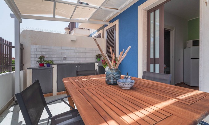 Portopalo di Capo Passero Apartamento | Apartamento "Andromeda Luxury Home" con terraza privada y Wi-Fi