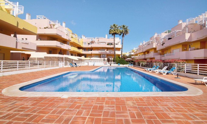 Canada Apartamento | Apartamento 'Apartamento Royal Cabanas Golf' con piscina compartida, Wi-Fi y aire acondicionado.