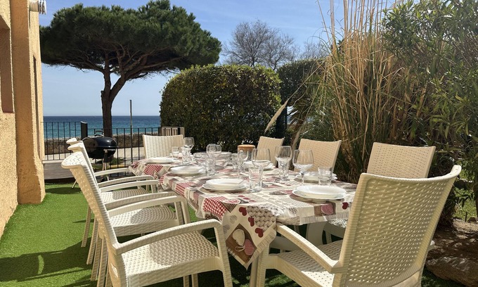 La Fosca Apartamento | Apartamento con jardín a 11 metros de la playa de arena de la Fosca. B1.
