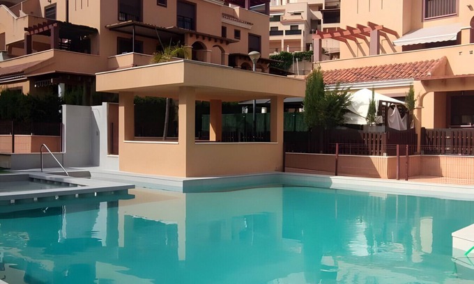 Los Geraeos Apartamento | Apartamento 'Brisa Del Mar' con piscina compartida, Wi-Fi y aire acondicionado
