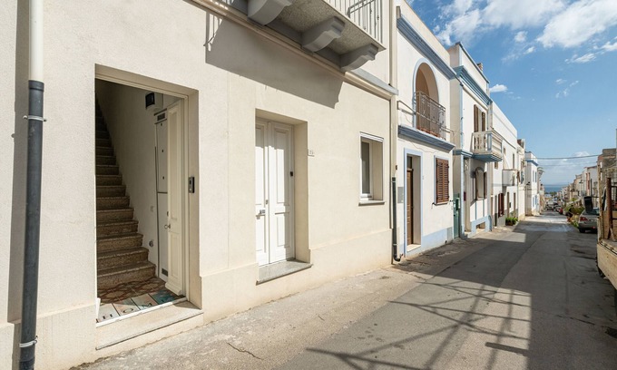 Calasetta Apartamento | Apartamento 'Casa Vacanze Riflessi Sul Mare' con balcón, Wi-Fi y aire acondicionado