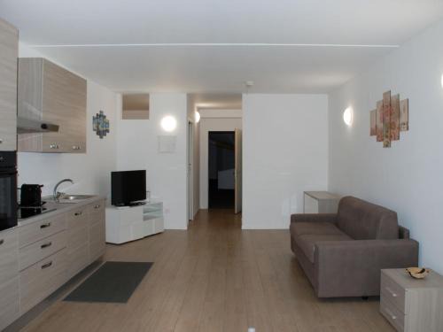 Bissone Apartamento | Apartment Charming Gardenview App- 102 by Interhome