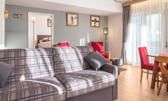 Vigo di Fassa Apartamento | 'Ciasa De Marugiana' cerca de la zona de esquí con vistas a la montaña, conexión Wi-Fi y terraza.
