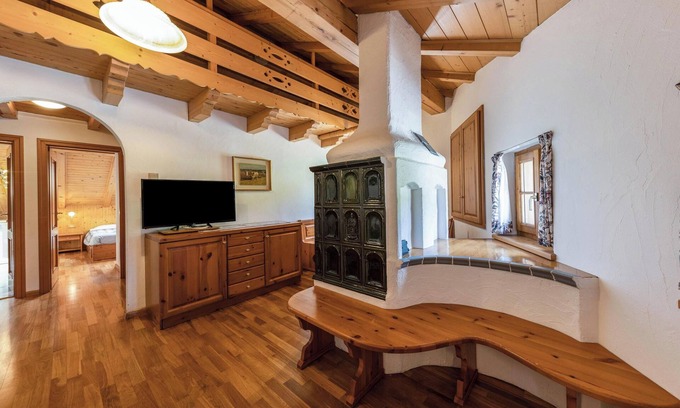 Vigo di Fassa Apartamento | Apartamento "Ciasa Sommavilla Mansarda" con vistas a la montaña, jardín compartido y Wi-Fi