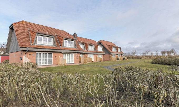 Friedrichskoog-Spitze Apartamento | Apartamento 'Nordseeperle' con terraza privada y jardín comunitario