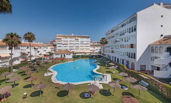 El Portil Apartamento | Apartamento 'El Portil' con piscina compartida, Wi-Fi y aire acondicionado
