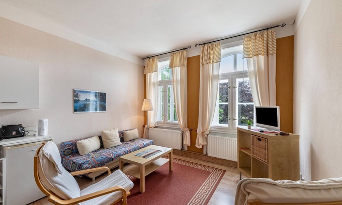 Krakow am See Apartamento | Apartamento 'Ferienwohnung 9' con terraza y jardín compartidos