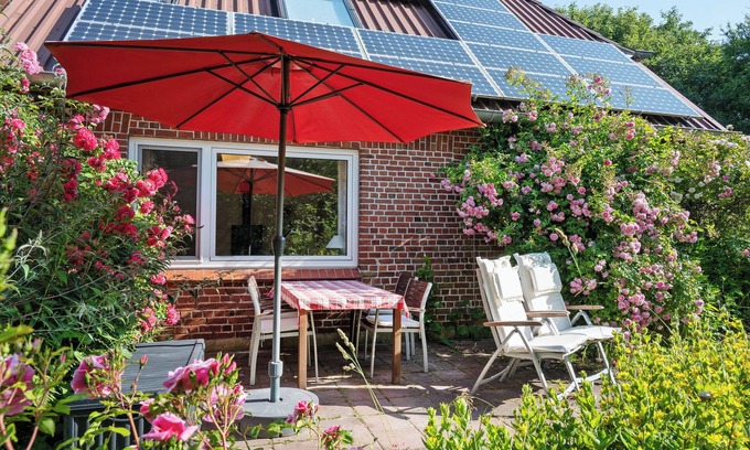 Pellworm Apartamento | Apartamento 'Ferienwohnung Gartenfreude' con terraza privada, jardín privado y Wi-Fi