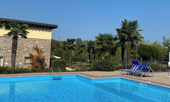 Lonato del Garda Apartamento | Apartamento 'Garda Paradise Casa de campo' con piscina, jardín y Wi-Fi