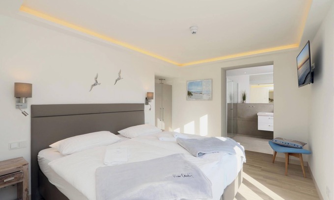 Prora Apartamento | Apartamento 'Gardensuite Binz' con piscina, Wi-Fi y terraza