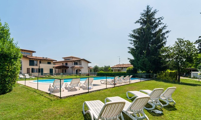 Cunettone Casa | Apartamento en Salò con piscina y olivos