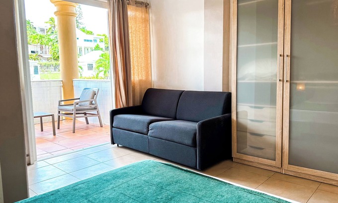 Anse des Rochers Apartamento | Apartamento en piscina y residencia de playa
