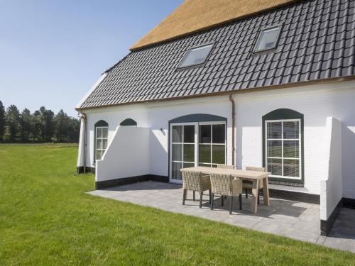De Cocksdorp Casa | Apartment in tasteful farmhouse in De Cocksdorp