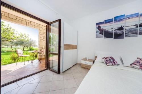 Zaton Apartamento | Apartment in Zaton (Zadar) with Terrace, Air conditioning, Wi-Fi, Washing machine (4814-4)