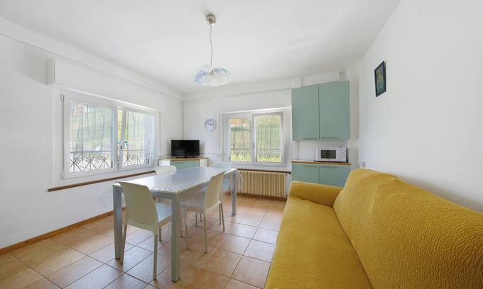 San Pietro di Cadore Apartamento | Apartamento 'Arancio' con vistas a la montaña, terraza privada y Wi-Fi
