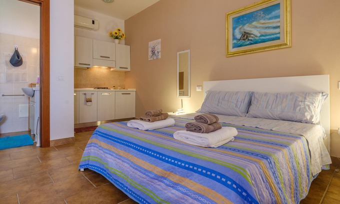 Borgagne Apartamento | Apartamento 'Mamba House 3' con terraza privada, jardín compartido y aire acondicionado