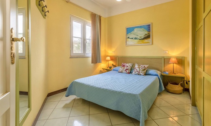 Canneddi Apartamento | Apartamento 'Nature Relax 113' con vistas al mar, terraza privada y aire acondicionado.