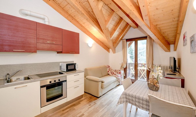Carisolo Apartamento | Apartamento 'Rosa delle Dolomiti Bilocale3' con vistas a la montaña y sauna compartida