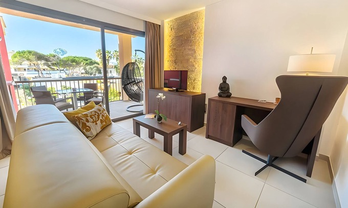 Cala Agulla Apartamento | Apartamento 'Suite 3' con piscina compartida, Wi-Fi y aire acondicionado