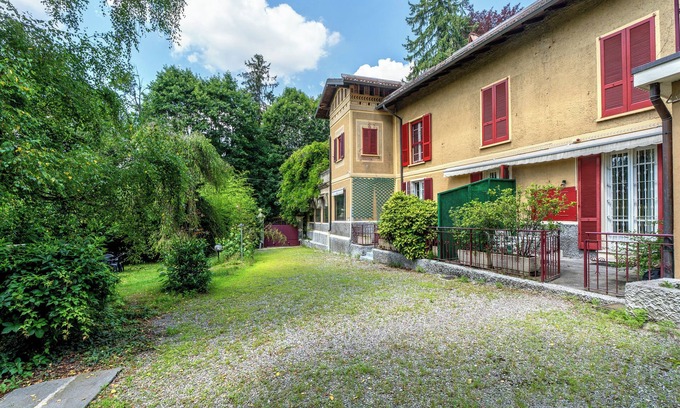 Capolago Apartamento | Apartamento 'Suite Con Camino E Terrazza' con terraza privada, jardín compartido y Wi-Fi