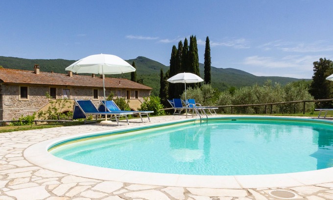 Chianni Casa | Apartamento de un dormitorio, cocina y baño Jardín y piscina comunitaria