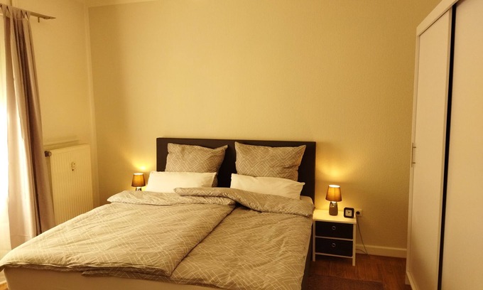 Bad Salzuflen Apartamento | Apartment with fireplace, terrace and beach area