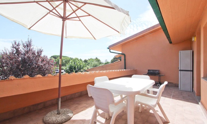 Il Poggio Apartamento | Apartamento con terraza con vista al lago y jardín privado cerca de la playa.