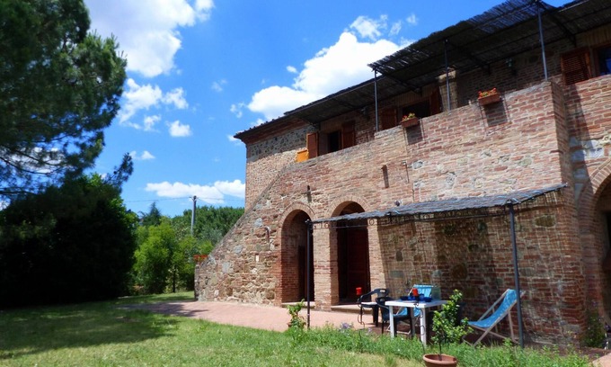 Torrita di Siena Apartamento | Apartamento con una hermosa vista del campo.