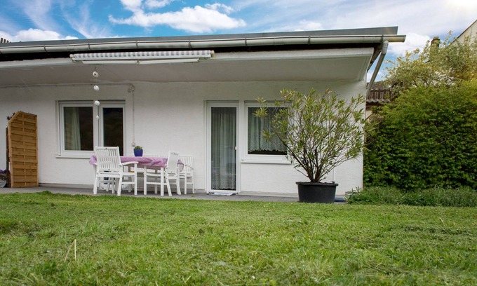Enkirch Apartamento | Apartamento con gran terraza en el jardín soleado y vistas al Mosela